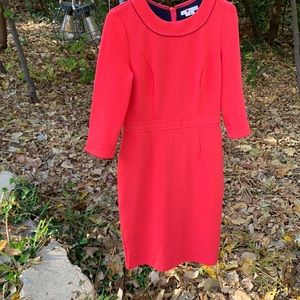 Dress fully lined, soft red in color, 3/4 length sleeves. Worn twice.
